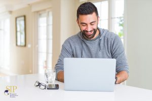 man using his laptop