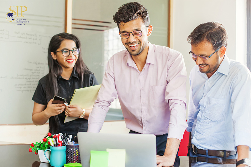 employees having a discussion in the office