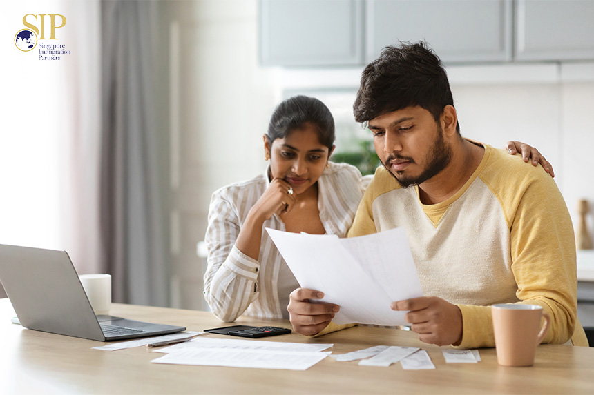 Couple reviewing new policies